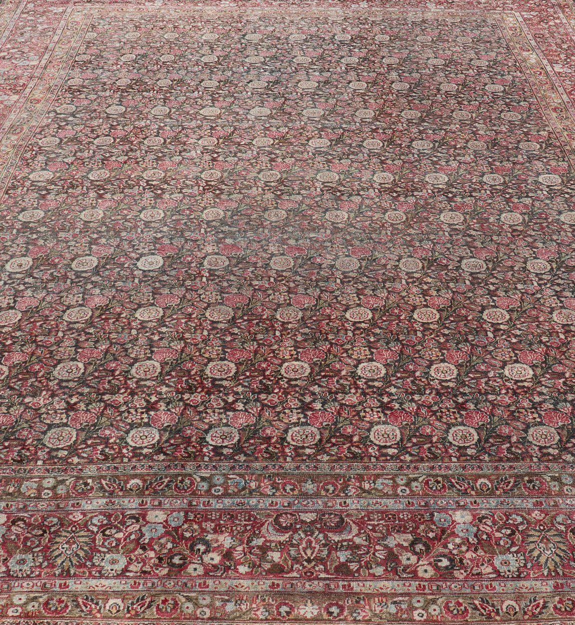 Antique Persian Khorasan Rug with Floral Design in Charcoal, Brown & Rose Red. Distressed Persian Rug Antique distressed rug. distressed antique rug Large Antique Persian Khorasan rug with floral design in charcoal background and, red pink. Keiv... - Keivan Woven ArtsEMB - 8502 - 178037 - 13618Rug