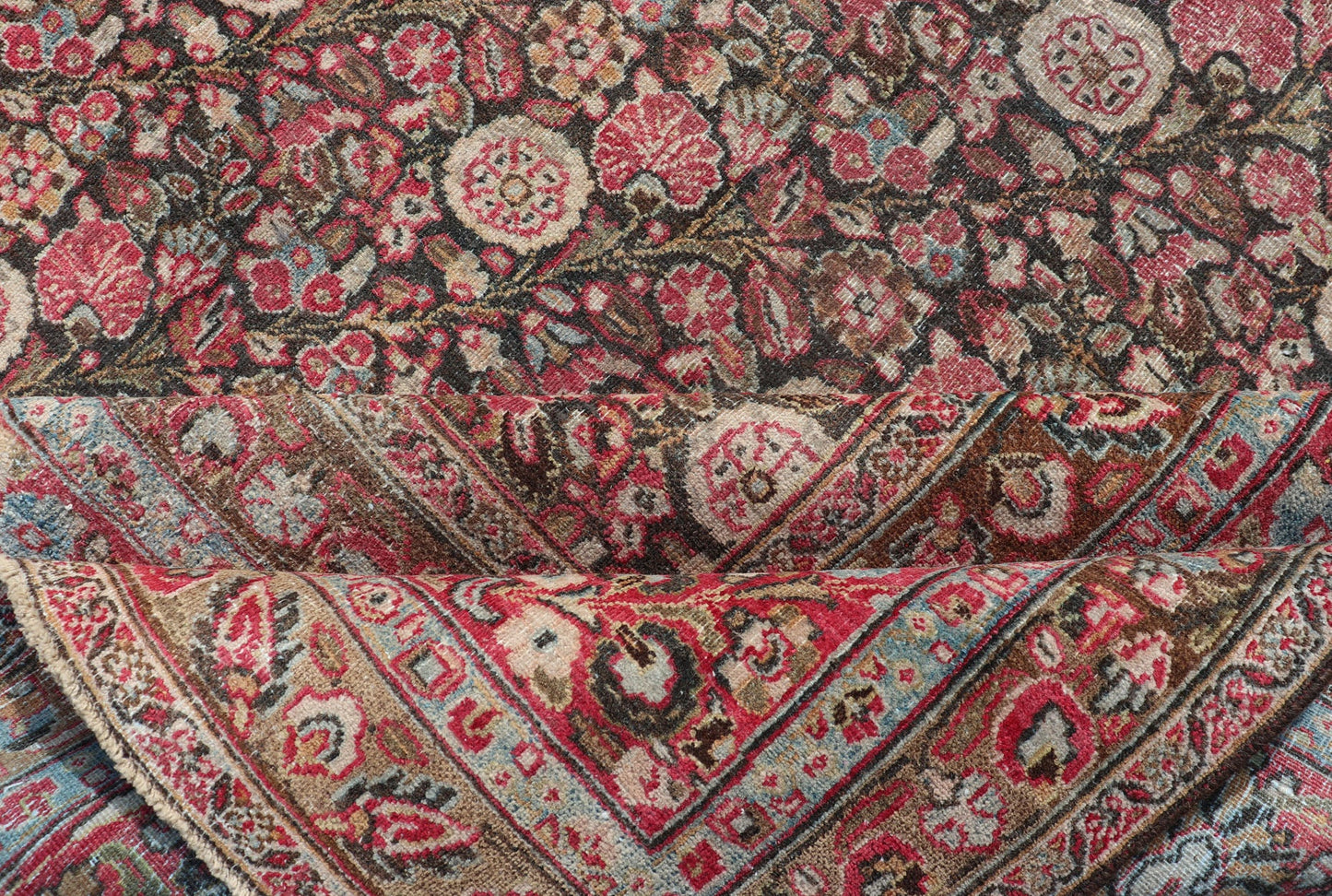 Antique Persian Khorasan Rug with Floral Design in Charcoal, Brown & Rose Red. Distressed Persian Rug Antique distressed rug. distressed antique rug Large Antique Persian Khorasan rug with floral design in charcoal background and, red pink. Keiv... - Keivan Woven ArtsEMB - 8502 - 178037 - 13618Rug