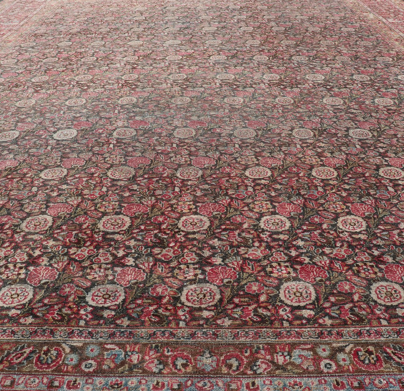 Antique Persian Khorasan Rug with Floral Design in Charcoal, Brown & Rose Red. Distressed Persian Rug Antique distressed rug. distressed antique rug Large Antique Persian Khorasan rug with floral design in charcoal background and, red pink. Keiv... - Keivan Woven ArtsEMB - 8502 - 178037 - 13618Rug
