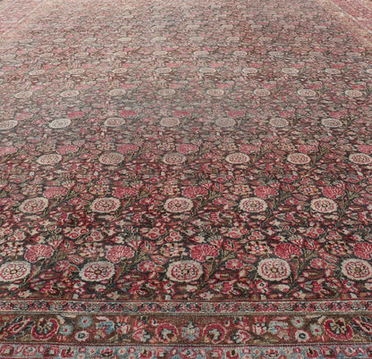 Antique Persian Khorasan Rug with Floral Design in Charcoal, Brown & Rose Red. Distressed Persian Rug Antique distressed rug. distressed antique rug Large Antique Persian Khorasan rug with floral design in charcoal background and, red pink. Keiv... - Keivan Woven ArtsEMB - 8502 - 178037 - 13618Rug