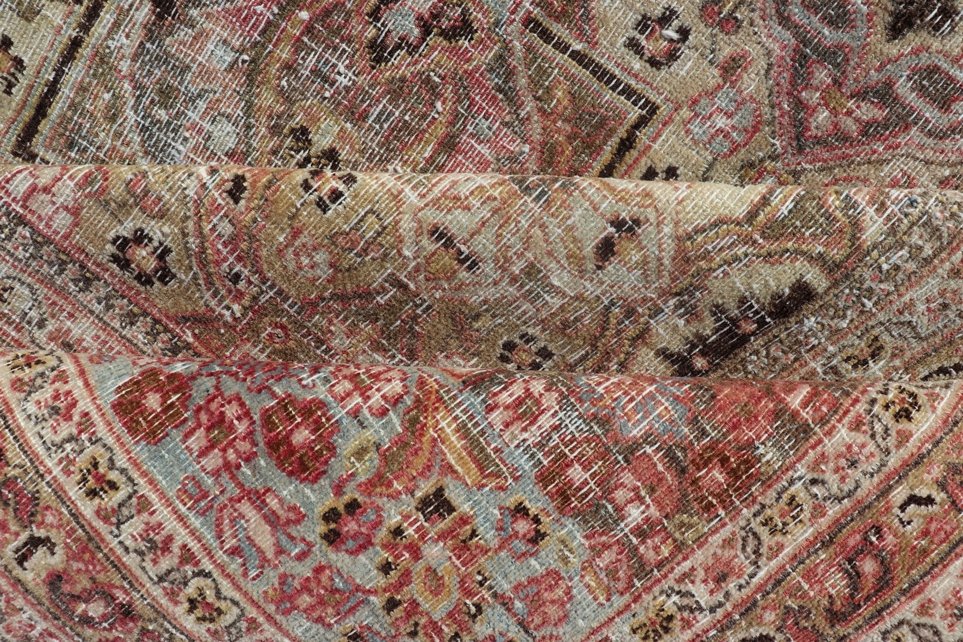 Distressed Antique Persian Khorassan Rug with Palmettes, Geometric Flowers in Soft Tones Distressed Antique Persian Khorassan Rug with Stretched Palmettes and Vining Flowers, Keivan Woven Arts rug/EMB - 8503, origin/ Iran. Colors include light g... - Keivan Woven ArtsEMB - 8503 - 178039 - 13624Rug