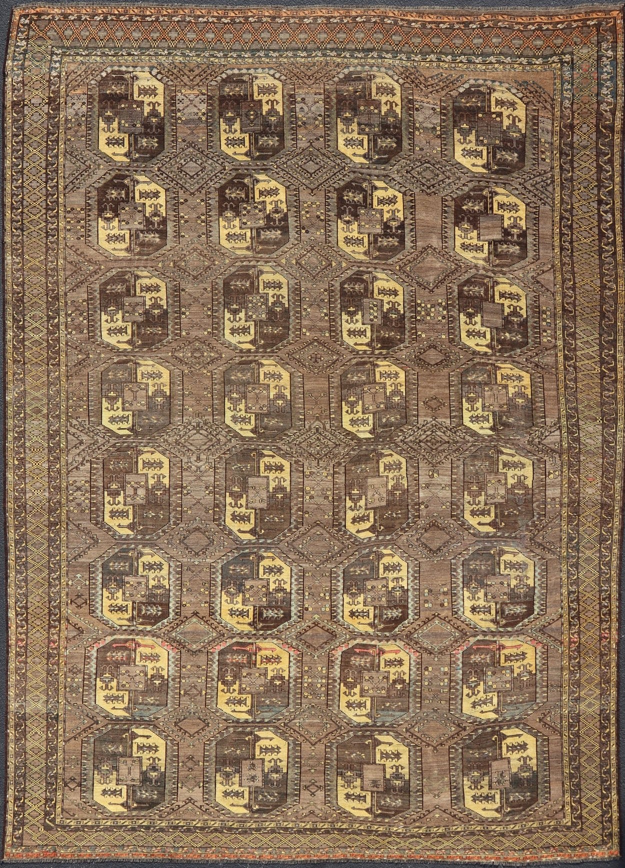 Large Antique Turkomen Ersari Rug with All - Over Bokhara Design in Coffee, Tan, Brown and Yellow Antique Persian rug in neutral tones with geometric motifs and yellow, rug EMB - 8511, Turkomen, circa 1930. This Turkomen carpet from 1930 is c... - Keivan Woven ArtsEMB - 8511 - 178412 - 13642Rug