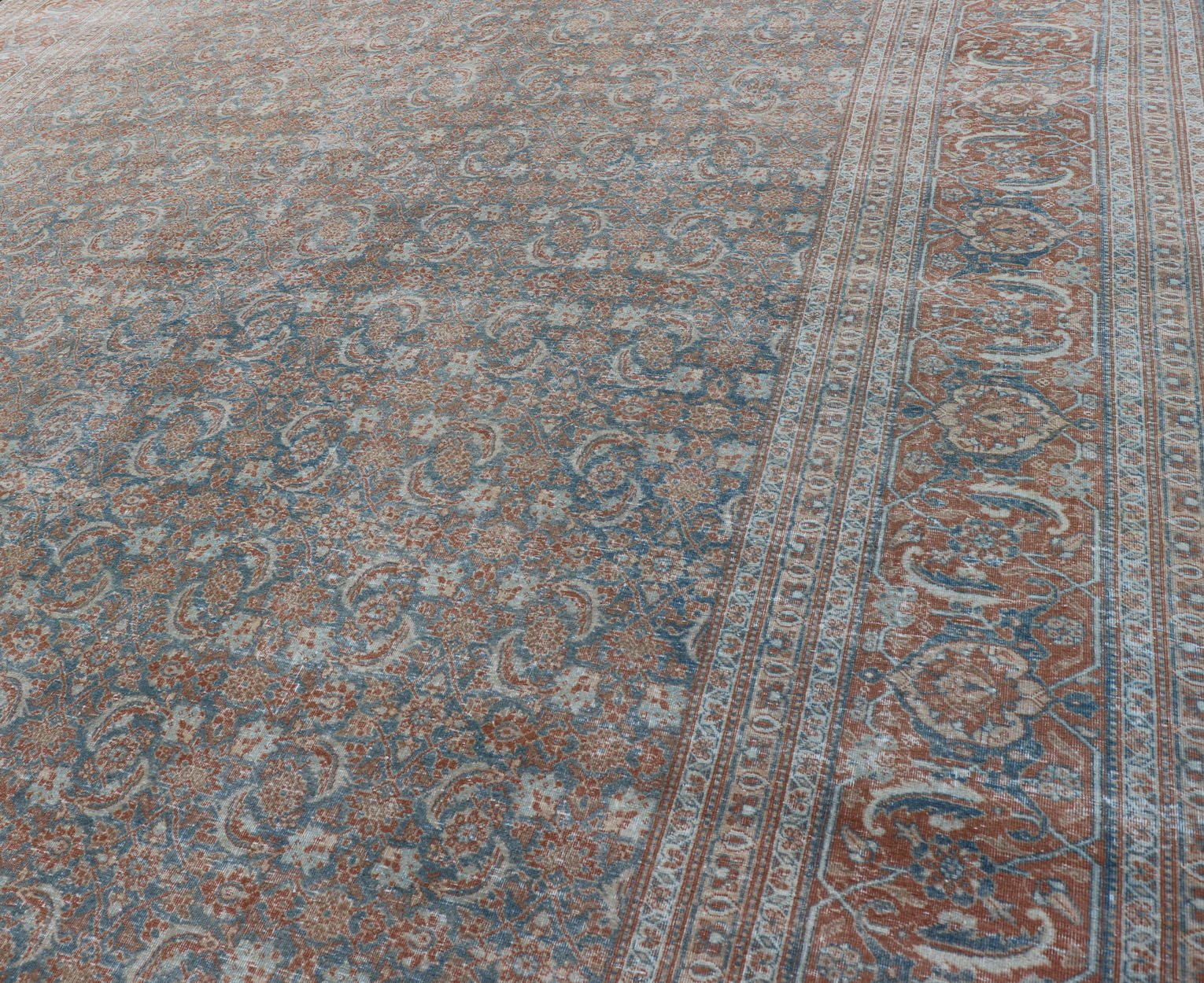 Large Distressed Antique Persian Tabriz Carpet with Herati Design in Gray Blue & Orange Red. Distressed antique rug. distressed Tabriz. Distressed Persian rug Antique Persian large distressed Tabriz rug with all over Herati and geometric design... - Keivan Woven ArtsEMB - 8514 - 178292 - 13658Rug