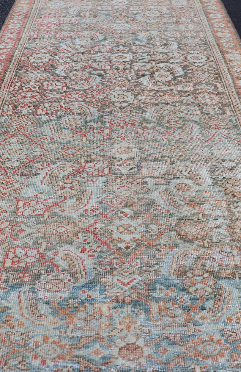 Antique Hand - Knotted Persian Hamadan Runner with Large Medallion Design This antique hand - knotted Persian Hamadan runner features an all - over floral design centered in a large medallion and is enclosed within a complementary multi - tiered border... - Keivan Woven ArtsEMB - 8515 - 178692 - 13752Rug