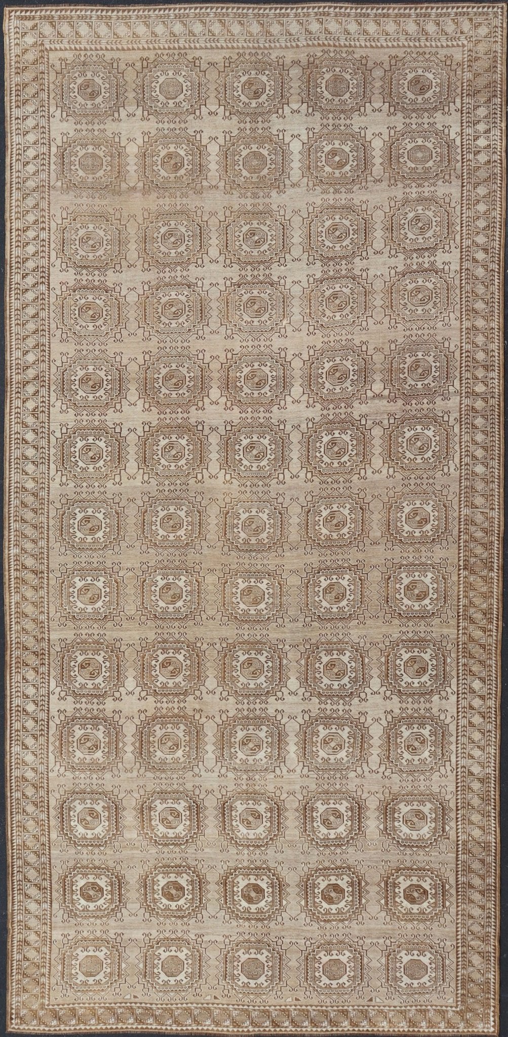 Vintage Hand - Knotted Turkman Rug with Repeating Sub - Geometric Octagonal Design This vintage hand - knotted Turkman rug features an all - over repeating sub - geometric octagonal design, rendered in ivory and earthy tones; making this rug a perfect fi... - Keivan Woven ArtsEMB - 8517 - 178547 - 13756Rug