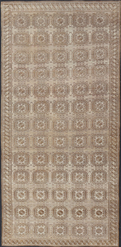 Vintage Hand - Knotted Turkman Rug with Repeating Sub - Geometric Octagonal Design This vintage hand - knotted Turkman rug features an all - over repeating sub - geometric octagonal design, rendered in ivory and earthy tones; making this rug a perfect fi... - Keivan Woven ArtsEMB - 8517 - 178547 - 13756Rug