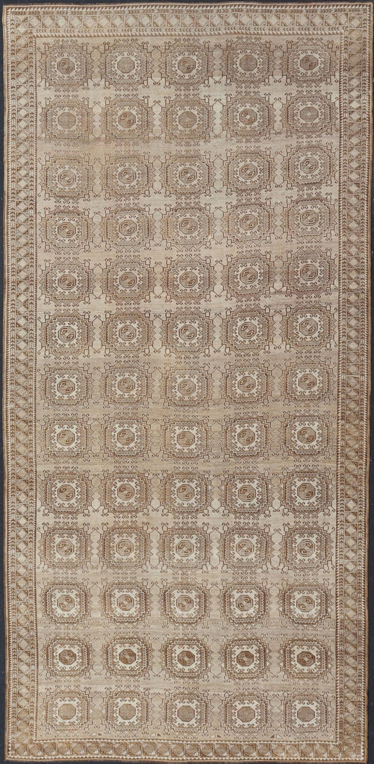 Vintage Hand - Knotted Turkman Rug with Repeating Sub - Geometric Octagonal Design This vintage hand - knotted Turkman rug features an all - over repeating sub - geometric octagonal design, rendered in ivory and earthy tones; making this rug a perfect fi... - Keivan Woven ArtsEMB - 8517 - 178547 - 13756Rug