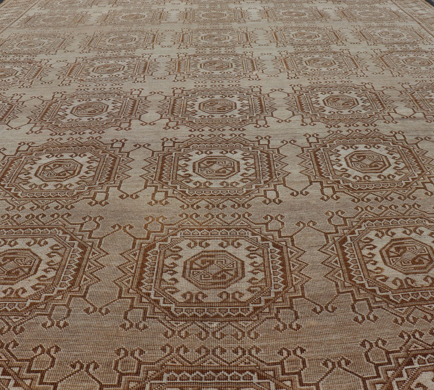 Vintage Hand - Knotted Turkman Rug with Repeating Sub - Geometric Octagonal Design This vintage hand - knotted Turkman rug features an all - over repeating sub - geometric octagonal design, rendered in ivory and earthy tones; making this rug a perfect fi... - Keivan Woven ArtsEMB - 8517 - 178547 - 13756Rug