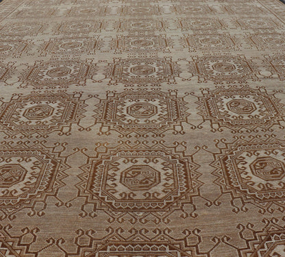 Vintage Hand - Knotted Turkman Rug with Repeating Sub - Geometric Octagonal Design This vintage hand - knotted Turkman rug features an all - over repeating sub - geometric octagonal design, rendered in ivory and earthy tones; making this rug a perfect fi... - Keivan Woven ArtsEMB - 8517 - 178547 - 13756Rug