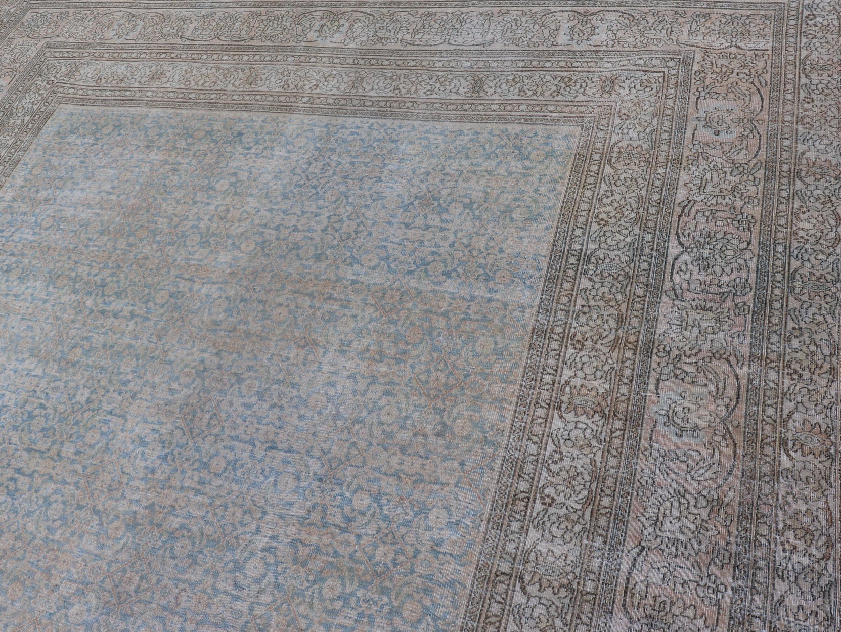 Antique Hand - Knotted Persian Mashad Rug with Sub - Geometric Floral & Diamond Design This antique hand - knotted Persian Mashad rug features a sub - geometric diamond design placed upon an all - over floral pattern and is enclosed within a complementary... - Keivan Woven ArtsEMB - 8520 - 178548 - 13760Rug