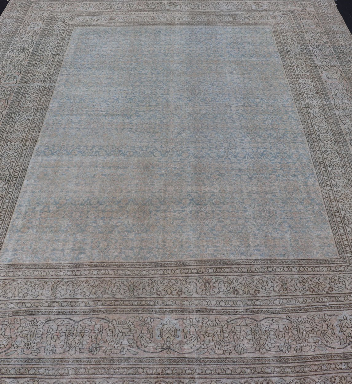Antique Hand - Knotted Persian Mashad Rug with Sub - Geometric Floral & Diamond Design This antique hand - knotted Persian Mashad rug features a sub - geometric diamond design placed upon an all - over floral pattern and is enclosed within a complementary... - Keivan Woven ArtsEMB - 8520 - 178548 - 13760Rug
