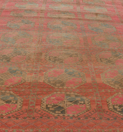 Large Turkomen Ersari Rug with All - Over Gul Design in Tan, Coral, and Brown. Antique Persian Ersari/ Turkomen rug in coral/red tones with geometric motifs. Keivan Woven Arts / rug EMB - 8522 - 178691, Turkomen, circa 1930. Measures: 10'4 x 15'6 This... - Keivan Woven ArtsEMB - 8522 - 178691 - 13668Rug