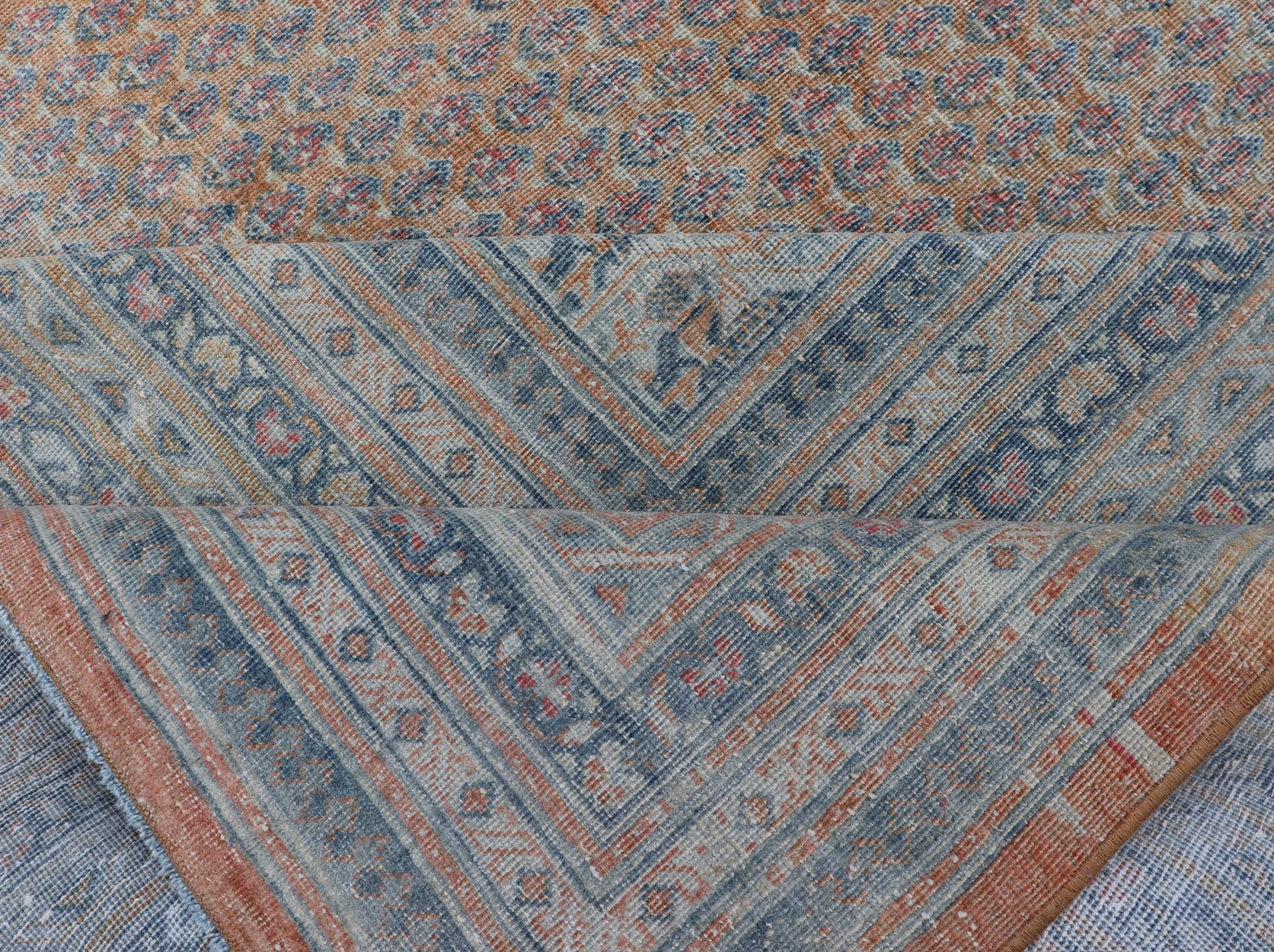 Minimalist Design Persian Tabriz Rug with Soft Orange Background, silver & Blue large antique Persian Tabriz rug with all - over Paisley Field, Keivan Woven Arts / rug /EMB - 8527 - 178686, country of origin / type: Iran/ Tabriz , circa 1930. M... - Keivan Woven ArtsEMB - 8527 - 178686 - 13690Rug