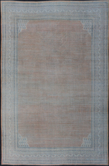 Minimalist Design Persian Tabriz Rug with Soft Orange Background, silver & Blue large antique Persian Tabriz rug with all - over Paisley Field, Keivan Woven Arts / rug /EMB - 8527 - 178686, country of origin / type: Iran/ Tabriz , circa 1930. M... - Keivan Woven ArtsEMB - 8527 - 178686 - 13690Rug