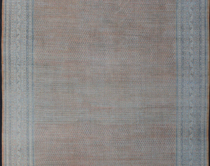 Minimalist Design Persian Tabriz Rug with Soft Orange Background, silver & Blue large antique Persian Tabriz rug with all - over Paisley Field, Keivan Woven Arts / rug /EMB - 8527 - 178686, country of origin / type: Iran/ Tabriz , circa 1930. M... - Keivan Woven ArtsEMB - 8527 - 178686 - 13690Rug