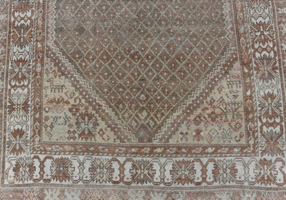 distressed Antique Persian Kurdish Rug in Gray/Brown Background with Taupe Tan & Soft Red. Softly colored antique distressed Persian Kurdish with all - over tribal design in soft colors of gray, charcoal, brown, tan cream, green , rug EMB - 8529 - 17... - Keivan Woven ArtsEMB - 8529 - 178682 - 13696Rug