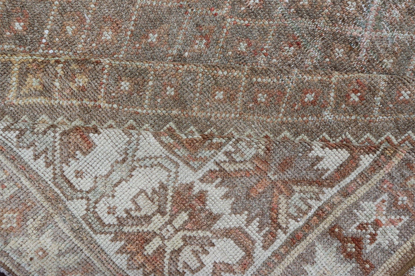 distressed Antique Persian Kurdish Rug in Gray/Brown Background with Taupe Tan & Soft Red. Softly colored antique distressed Persian Kurdish with all - over tribal design in soft colors of gray, charcoal, brown, tan cream, green , rug EMB - 8529 - 17... - Keivan Woven ArtsEMB - 8529 - 178682 - 13696Rug