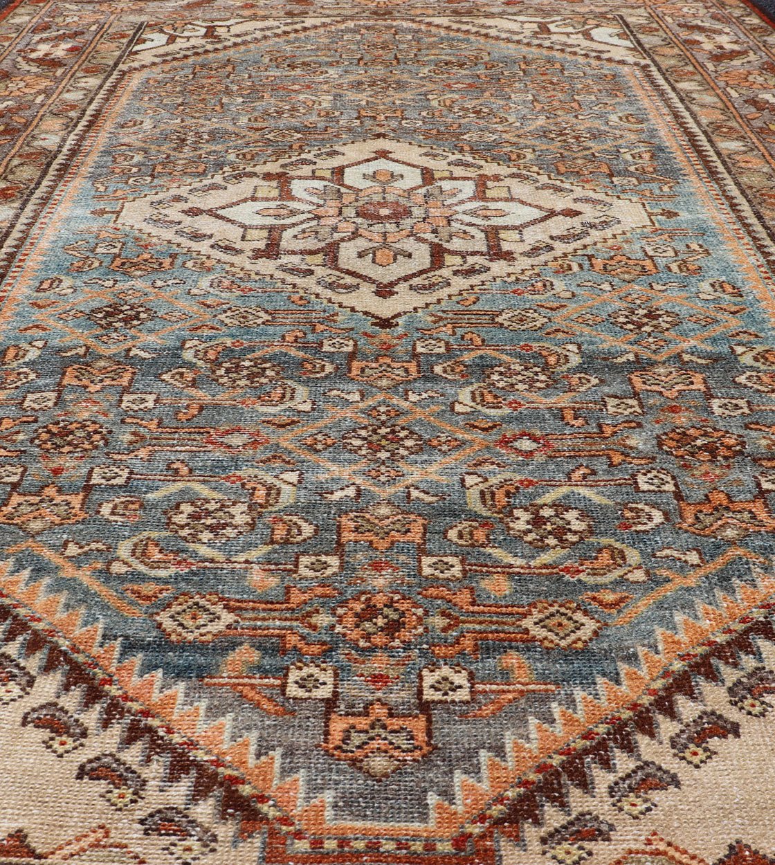Antique Persian Hamadan Rug with Central Medallion & Sub - Geometric Floral Design This antique Persian Hamadan rug features a layered medallion with sub - geometric flowers design, and is enclosed within a complementary, multi - tiered border. Rend... - Keivan Woven ArtsEMB - 8532 - 178678 - 13708Rug