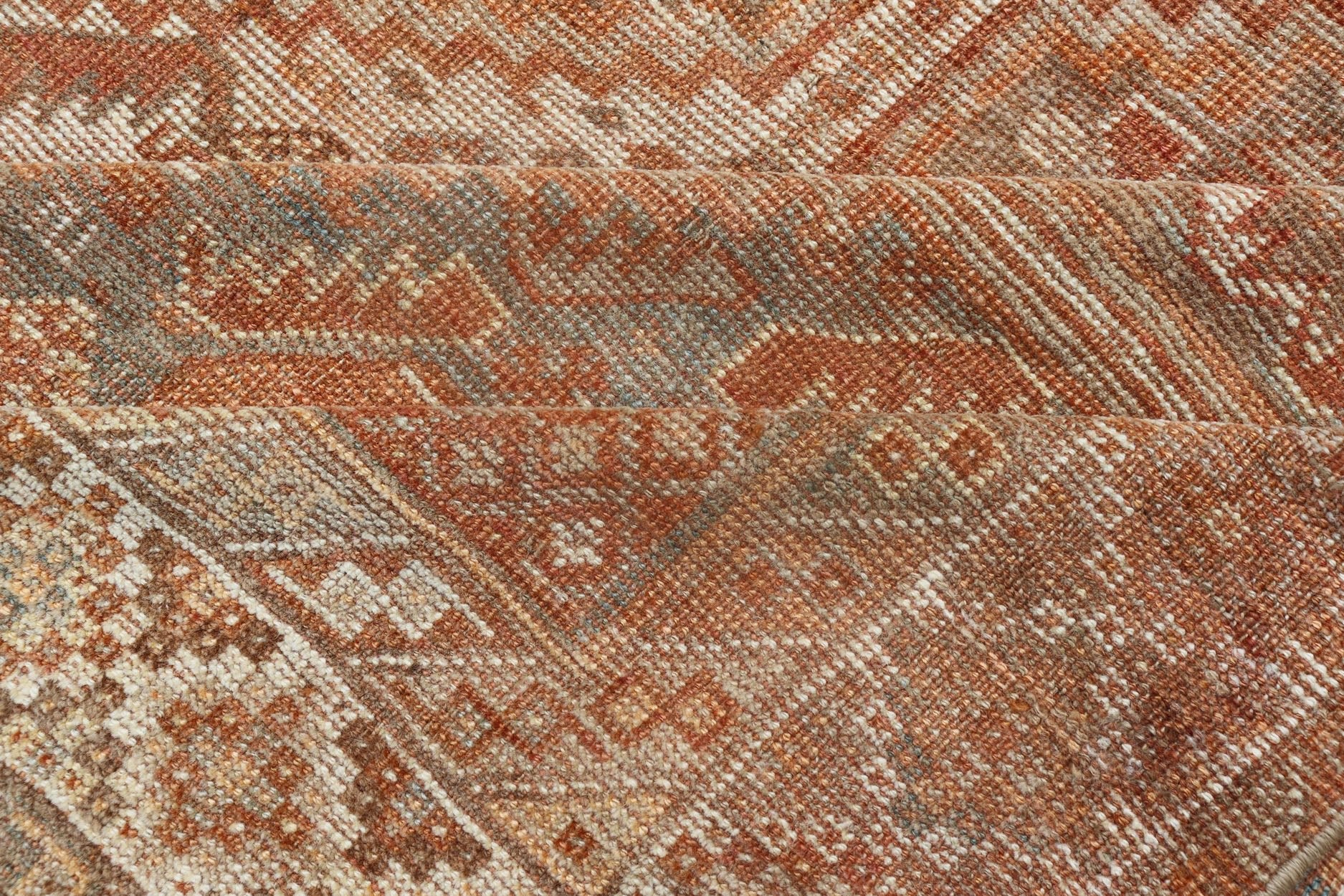 Antique Distressed Persian Shiraz Rug in Shades of Soft Orange, Lt. Brown, Gray. Persian antique Shiraz carpet in soft orange, light gray, light rust red and light brown with geometric medallions, rug EMB - 8545 - 06, country of origin / type: Iran... - Keivan Woven ArtsEMB - 8545 - 06 - 13806Rug