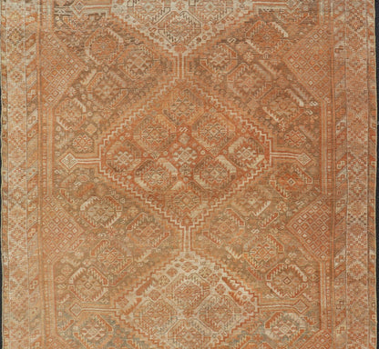Antique Distressed Persian Shiraz Rug in Shades of Soft Orange, Lt. Brown, Gray. Persian antique Shiraz carpet in soft orange, light gray, light rust red and light brown with geometric medallions, rug EMB - 8545 - 06, country of origin / type: Iran... - Keivan Woven ArtsEMB - 8545 - 06 - 13806Rug