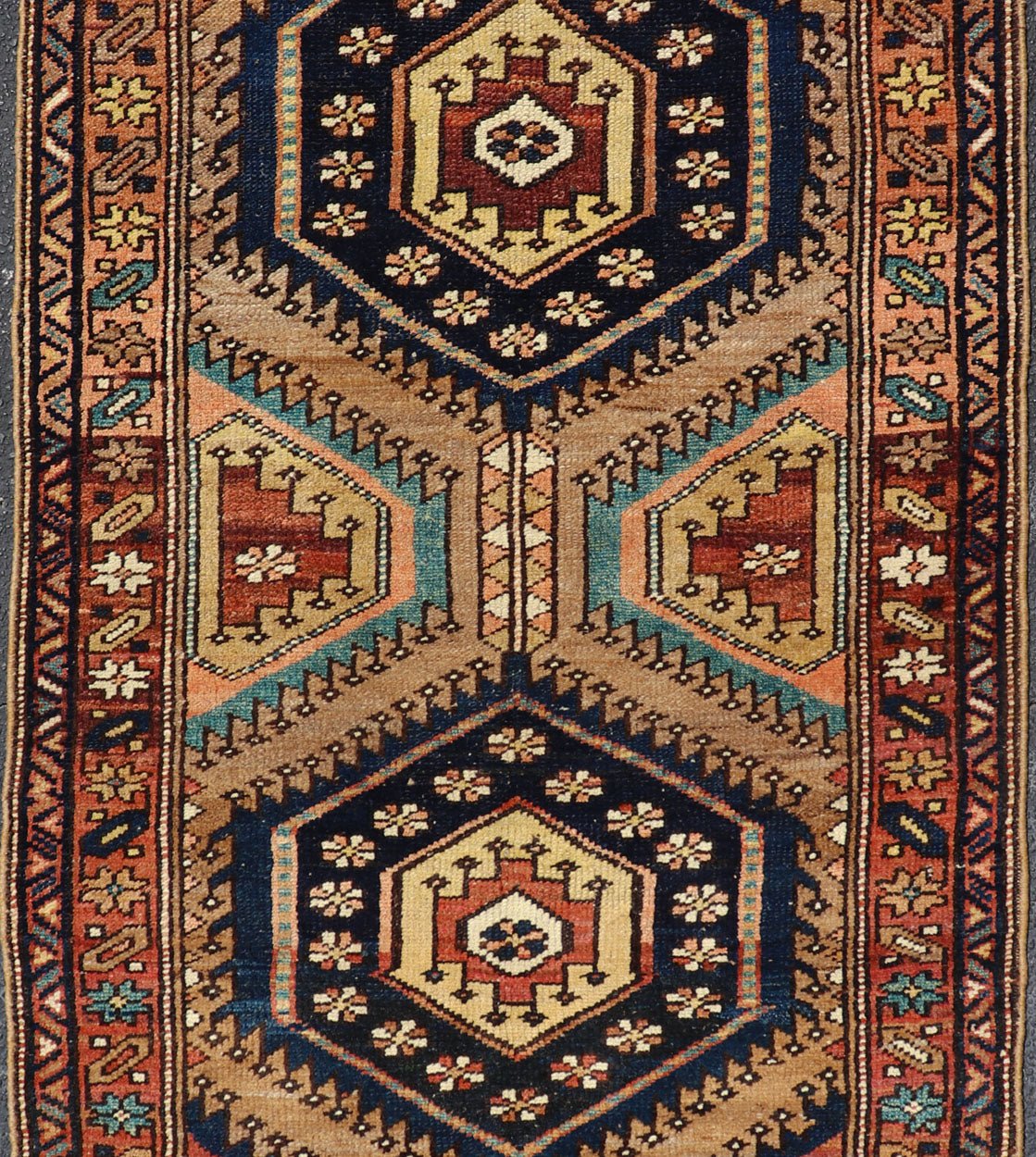 Antique Persian Kurdish Short Runner on Geometric Motifs in Light Camel Field. Medallion design on camel field, with dark blue medallions, green, red, blue , rug EMB - 8546 - 178695, country of origin / type: Iran / Hamedan, circa 1910 This ... - Keivan Woven ArtsEMB - 8546 - 178695 - 13812Rug
