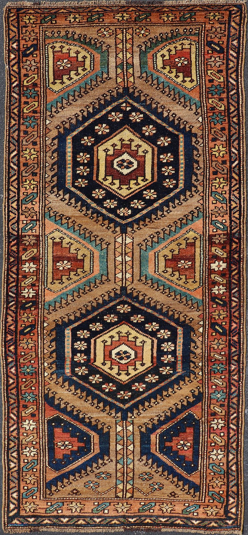 Antique Persian Kurdish Short Runner on Geometric Motifs in Light Camel Field. Medallion design on camel field, with dark blue medallions, green, red, blue , rug EMB - 8546 - 178695, country of origin / type: Iran / Hamedan, circa 1910 This ... - Keivan Woven ArtsEMB - 8546 - 178695 - 13812Rug