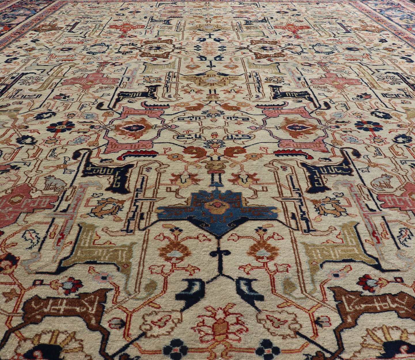 Antique Persian Tabriz Rug in Wool with All - Over Sub - Geometric Herati Design This antique Persian Tabriz rug features an all - over, sub - geometric unique design design rendered in multicolor, set upon an ivory background. A complementary, multi - ti... - Keivan Woven ArtsEMB - 9500 - P13583 - 14590Rug