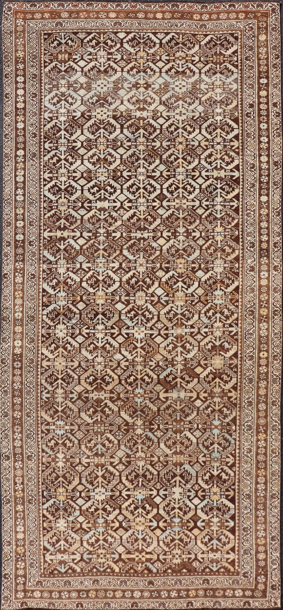 Kurdish Antique Gallery Runner with All - Over Tribal Design in Browns and Blue Antique Kurdish Gallery runner with all - over tribal geometric motifs. Keivan Woven Arts / rug EMB - 9501 - P13063, country of origin / type: Iran / Kurdish, circa 1920.... - Keivan Woven ArtsEMB - 9501 - P13063 - 14542Rug