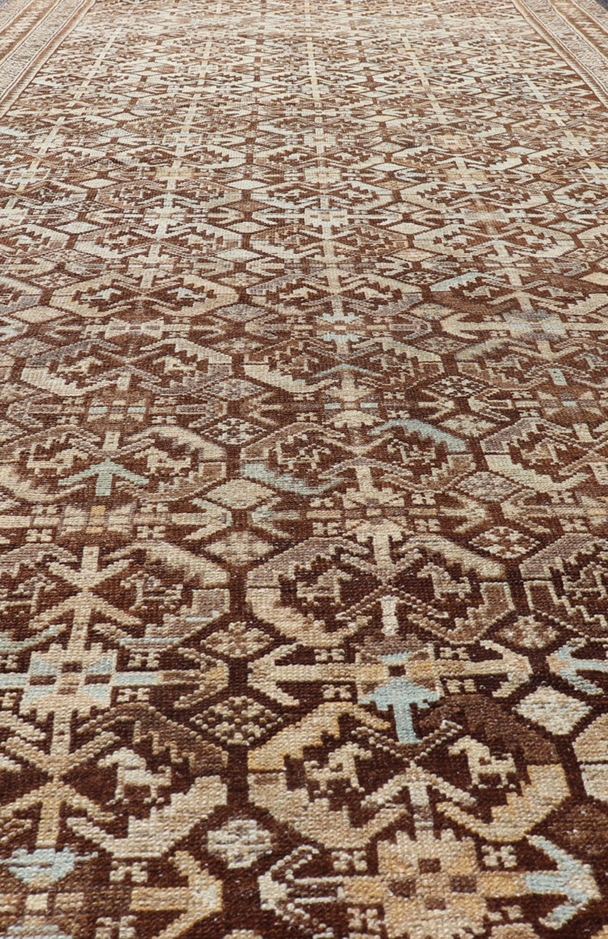 Kurdish Antique Gallery Runner with All - Over Tribal Design in Browns and Blue Antique Kurdish Gallery runner with all - over tribal geometric motifs. Keivan Woven Arts / rug EMB - 9501 - P13063, country of origin / type: Iran / Kurdish, circa 1920.... - Keivan Woven ArtsEMB - 9501 - P13063 - 14542Rug
