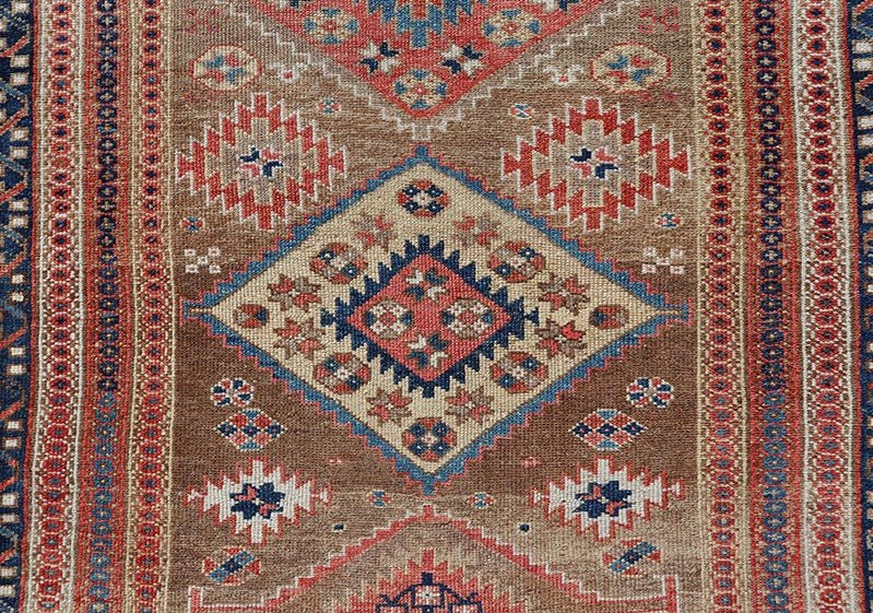 Antique Persian Kurdish Short Runner With Geometric Motifs in Light Camel Field Antique Persian Kurdish Short Runner With Geometric Motifs in Light Camel Field Medallion design on camel field, dark blue, red, ivory, and camel. Keivan Woven A... - Keivan Woven ArtsEMB - 9505 - P13067 - 14608Rug