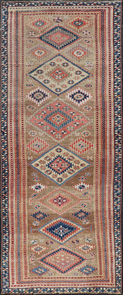 Antique Persian Kurdish Short Runner With Geometric Motifs in Light Camel Field Antique Persian Kurdish Short Runner With Geometric Motifs in Light Camel Field Medallion design on camel field, dark blue, red, ivory, and camel. Keivan Woven A... - Keivan Woven ArtsEMB - 9505 - P13067 - 14608Rug
