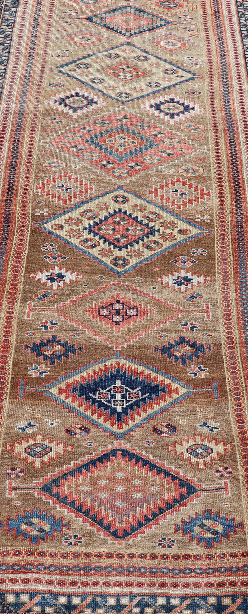 Antique Persian Kurdish Short Runner With Geometric Motifs in Light Camel Field Antique Persian Kurdish Short Runner With Geometric Motifs in Light Camel Field Medallion design on camel field, dark blue, red, ivory, and camel. Keivan Woven A... - Keivan Woven ArtsEMB - 9505 - P13067 - 14608Rug
