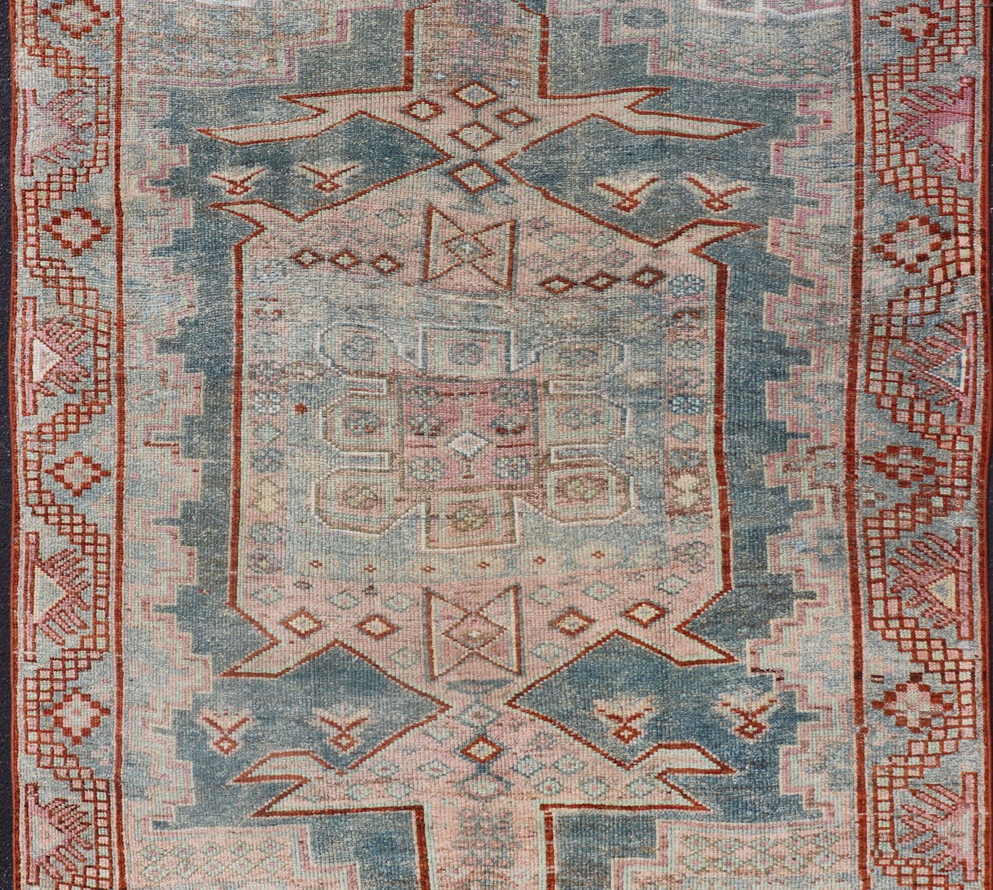 Persian Kurdish Antique Rug with Tribal Design in Light Blue, Teal, Taupe & Red Antique Kurdish rug with tribal geometric medallions in soft blue, pink, light blue, medium blue with hint of teal, brown, tape, salmon and red in the border. rug EM... - Keivan Woven ArtsEMB - 9509 - P13085 - 14620Rug
