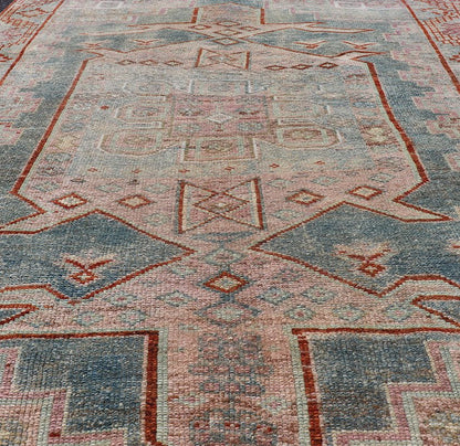 Persian Kurdish Antique Rug with Tribal Design in Light Blue, Teal, Taupe & Red Antique Kurdish rug with tribal geometric medallions in soft blue, pink, light blue, medium blue with hint of teal, brown, tape, salmon and red in the border. rug EM... - Keivan Woven ArtsEMB - 9509 - P13085 - 14620Rug