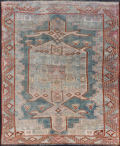 Persian Kurdish Antique Rug with Tribal Design in Light Blue, Teal, Taupe & Red Antique Kurdish rug with tribal geometric medallions in soft blue, pink, light blue, medium blue with hint of teal, brown, tape, salmon and red in the border. rug EM... - Keivan Woven ArtsEMB - 9509 - P13085 - 14620Rug