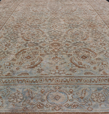 Antique Persian Tabriz Rug in Wool with All - Over Floral Design in Earth Colors This Tabriz rug features a relatively intricate and detailed border area and an entirely sparse and small repeating tribal motif in the center field. The tones of th... - Keivan Woven ArtsEMB - 9516 - P13065 - 14644Rug