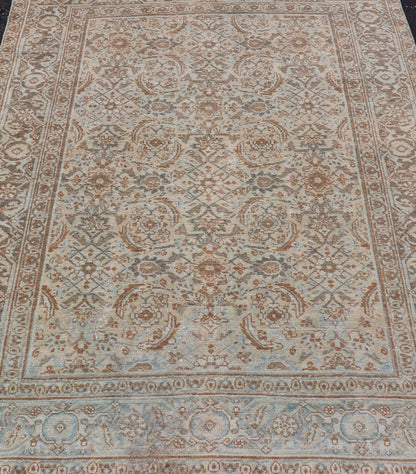 Antique Persian Tabriz Rug in Wool with All - Over Floral Design in Earth Colors This Tabriz rug features a relatively intricate and detailed border area and an entirely sparse and small repeating tribal motif in the center field. The tones of th... - Keivan Woven ArtsEMB - 9516 - P13065 - 14644Rug