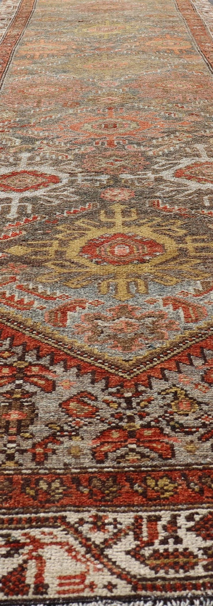 Antique Persian Hamadan Long Runner in Brown, Gray and Earth Tones Measures 2'6 x 16'3 This grand runner features a beautiful desert palette of orange, rustic gold, taupe, dulled cream, red, and camel, with a bright white border filled w... - Keivan Woven ArtsEMB - 9524 - P13062 - 14674Rug
