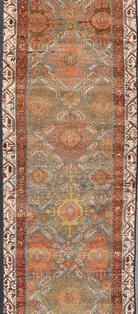 Antique Persian Hamadan Long Runner in Brown, Gray and Earth Tones Measures 2'6 x 16'3 This grand runner features a beautiful desert palette of orange, rustic gold, taupe, dulled cream, red, and camel, with a bright white border filled w... - Keivan Woven ArtsEMB - 9524 - P13062 - 14674Rug