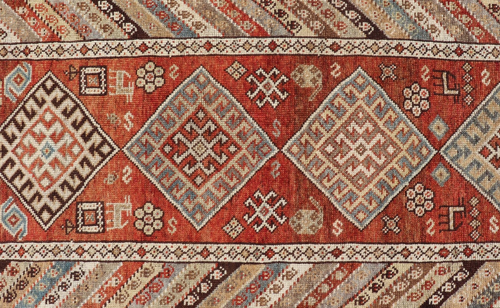 Antique Narrow And Long Kurdish Runner in Wool with Medallion Tribal Design This antique Persian Kurdish runner has been hand - knotted in wool and features a sub - geometric medallion design rendered in multicolor. A complementary, multi - tiered bor... - Keivan Woven ArtsEMB - 9525 - P13056 - 14680Rug
