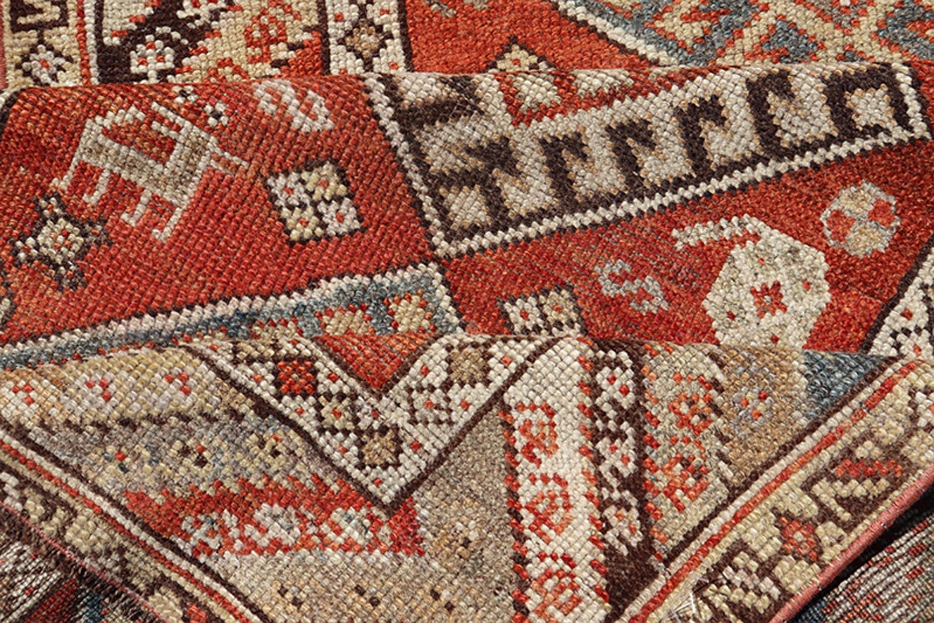 Antique Narrow And Long Kurdish Runner in Wool with Medallion Tribal Design This antique Persian Kurdish runner has been hand - knotted in wool and features a sub - geometric medallion design rendered in multicolor. A complementary, multi - tiered bor... - Keivan Woven ArtsEMB - 9525 - P13056 - 14680Rug