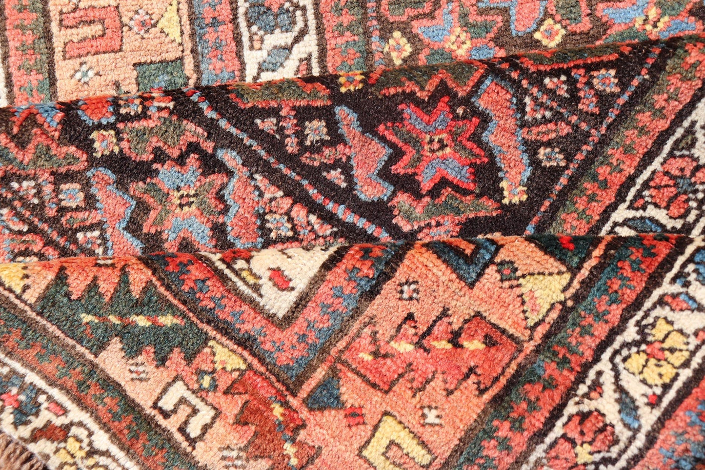 Antique Kurdish Runner with All - Over Geometric Design on A Blue Background Measures: 3'9 x 13'7 This antique runner from Persia features geometric tribal star motifs in a blue background, with accent colors of red, blue, green, and ... - Keivan Woven ArtsEMB - 9526 - P13054 - 14686Rug