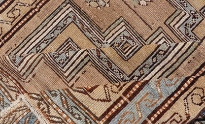 Antique Persian Kurdish Rug in Wool with Tri - Medallion Design in Brown and Blue This antique Persian Tabriz rug has been hand - knotted in wool and features a large tri - medallion design rendered in blue - gray and earthy tones. A complementary, mul... - Keivan Woven ArtsEMB - 9529 - P13069 - 14692Rug
