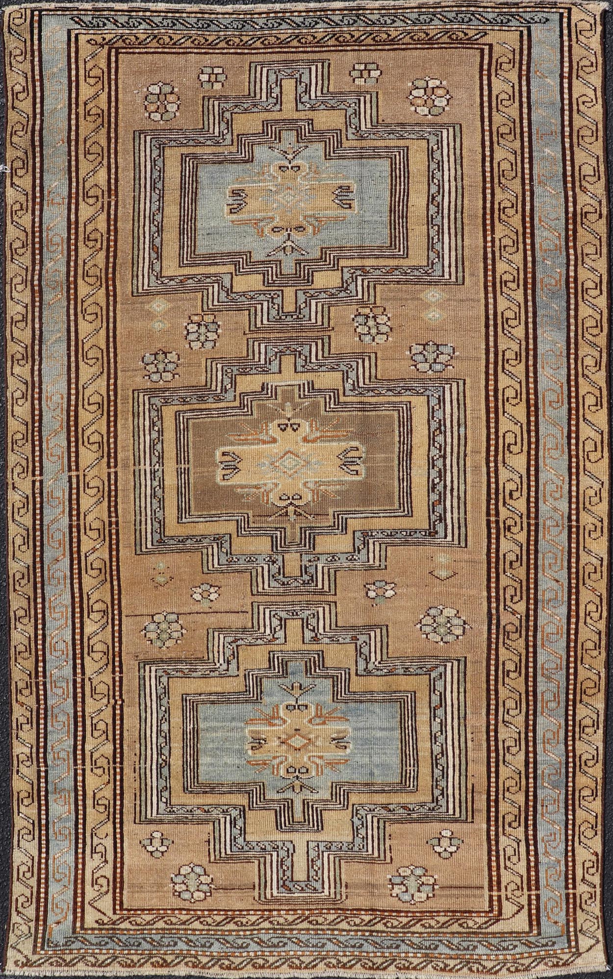 Antique Persian Kurdish Rug in Wool with Tri - Medallion Design in Brown and Blue This antique Persian Tabriz rug has been hand - knotted in wool and features a large tri - medallion design rendered in blue - gray and earthy tones. A complementary, mul... - Keivan Woven ArtsEMB - 9529 - P13069 - 14692Rug