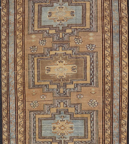 Antique Persian Kurdish Rug in Wool with Tri - Medallion Design in Brown and Blue This antique Persian Tabriz rug has been hand - knotted in wool and features a large tri - medallion design rendered in blue - gray and earthy tones. A complementary, mul... - Keivan Woven ArtsEMB - 9529 - P13069 - 14692