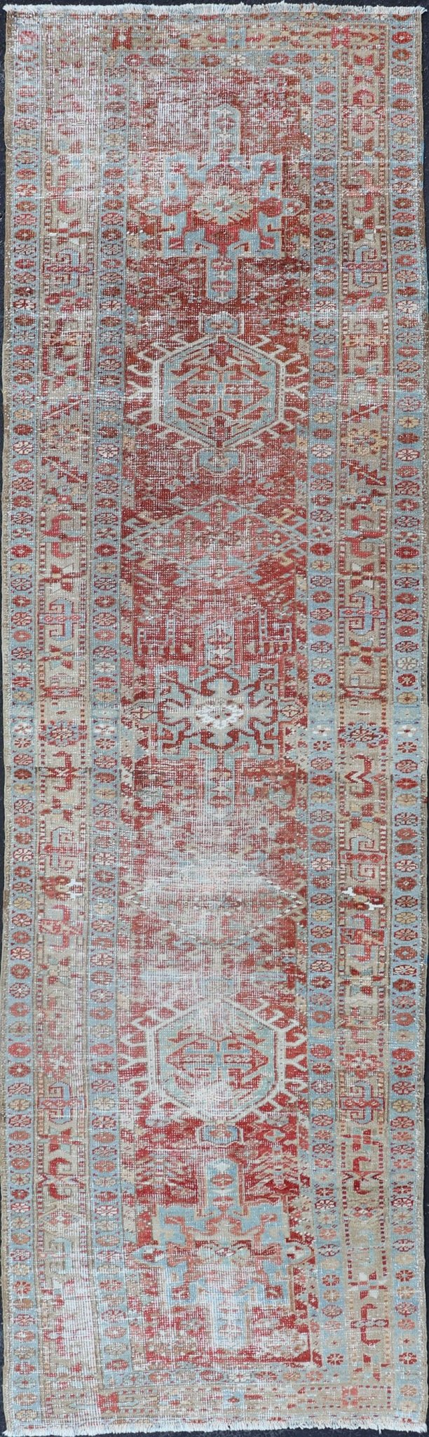 Antique Persian Heriz Distressed Runner with Geometrics in Red and Light Blue. Geometric Medallion design Persian distressed Heriz antique runner in soft red and blue tones, rug EMB - 9531 - 10 - P13034, country of origin / type: Iran / Heriz, circa 1... - Keivan Woven ArtsEMB - 9531 - 10 - P13034 - 14704Rug
