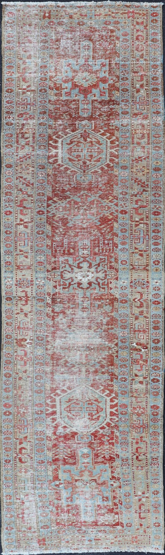 Antique Persian Heriz Distressed Runner with Geometrics in Red and Light Blue. Geometric Medallion design Persian distressed Heriz antique runner in soft red and blue tones, rug EMB - 9531 - 10 - P13034, country of origin / type: Iran / Heriz, circa 1... - Keivan Woven ArtsEMB - 9531 - 10 - P13034 - 14704Rug