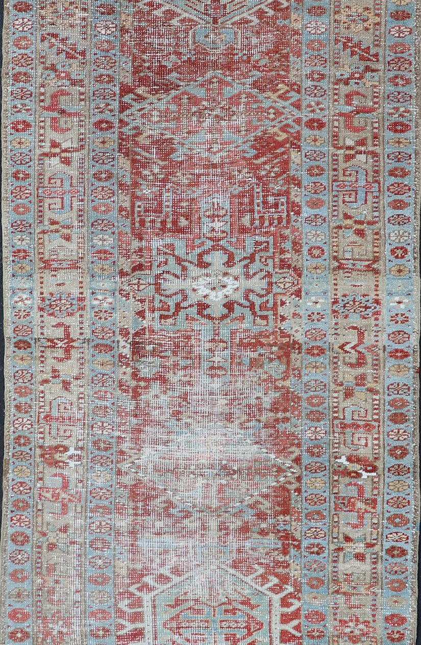 Antique Persian Heriz Distressed Runner with Geometrics in Red and Light Blue. Geometric Medallion design Persian distressed Heriz antique runner in soft red and blue tones, rug EMB - 9531 - 10 - P13034, country of origin / type: Iran / Heriz, circa 1... - Keivan Woven ArtsEMB - 9531 - 10 - P13034 - 14704Rug
