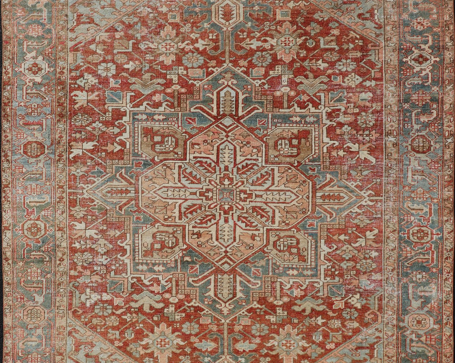 Antique Heriz Rug with All - Over Medallion Design in Red, Blue, Pink, Tan & Brown Antique Heriz Rug, rug EMB - 9533 - P13059, country of origin / type: Persian / Heriz, circa Early - 20th Century. Measures: 6'11 x 9'7. - Keivan Woven ArtsEMB - 9533 - P13059 - 14716Rug