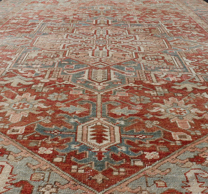 Antique Heriz Rug with All - Over Medallion Design in Red, Blue, Pink, Tan & Brown Antique Heriz Rug, rug EMB - 9533 - P13059, country of origin / type: Persian / Heriz, circa Early - 20th Century. Measures: 6'11 x 9'7. - Keivan Woven ArtsEMB - 9533 - P13059 - 14716Rug